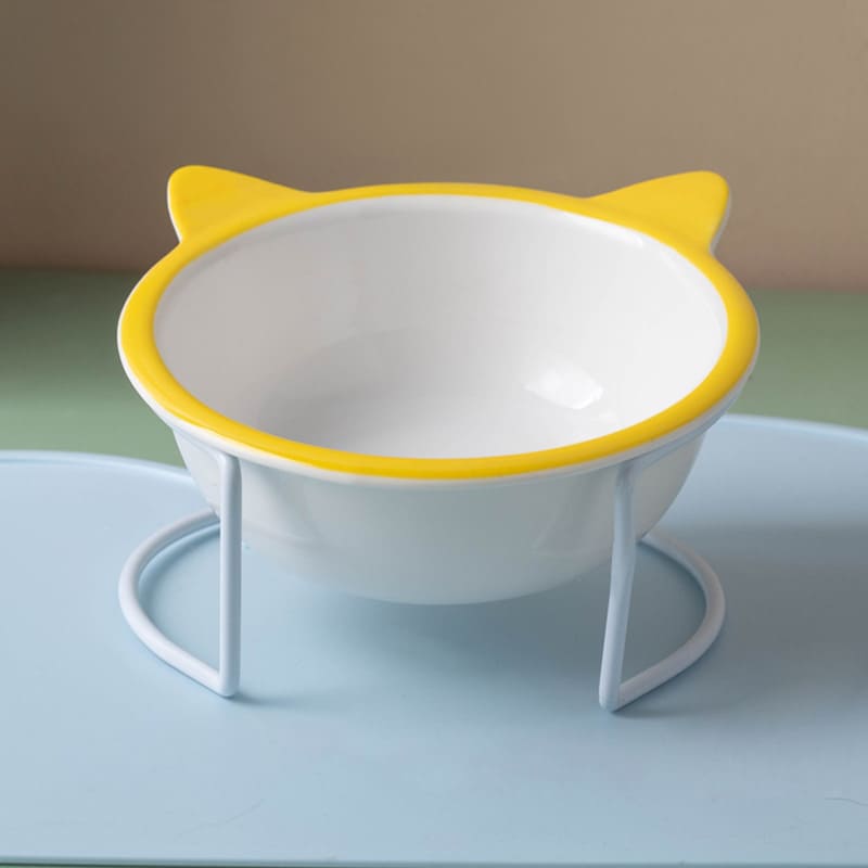 PLATO CERÁMICA CON OREJITAS Y BASE METAL